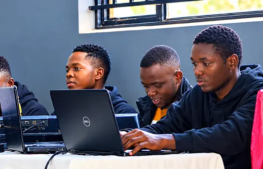 Learners receiving computer training